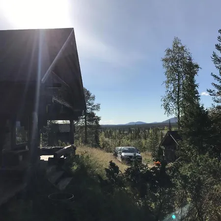 Northern Lights Opposite The Mountains